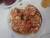 tomate, feta, poivron sur un pain greque
